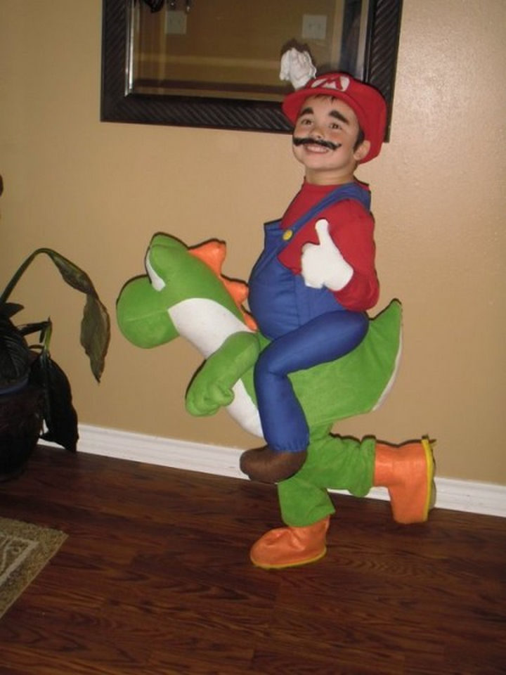 Super Mario riding Yoshi in Super Mario World.