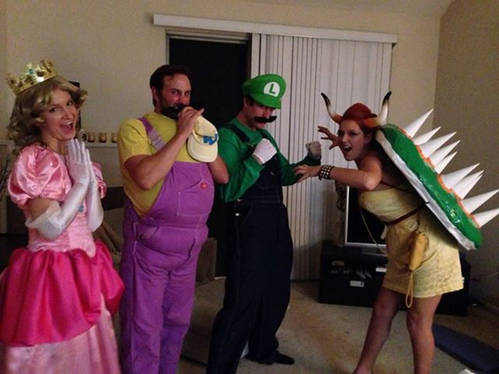 Halloween family fun as Luigi, Wario, Bowser and Princess Peach.